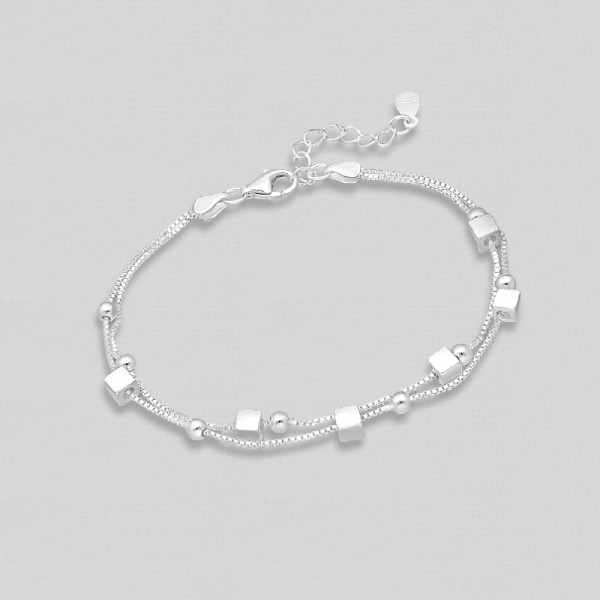 Srebrna zapestnica s kroglicami in kockami